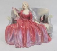 Early Royal Doulton china figure of a girl on a settee 'Sweet and Twenty' HN1298, 15cm high