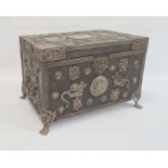 Eastern wooden casket of rectangular form, the body and hinged cover decorated with applied metal