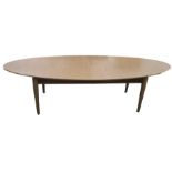 Two modern IKEA Stockholm oval coffee tables in oak finish, on four turned supports and light oak