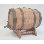 Miniature oak and bound barrel on stand, total height approx. 26cm