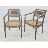 Set of six Regency-style ebonised dining open arm chairs, each with a panel decorated with classical