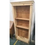 Painted pine bookcase, the stepped cornice over two adjustable shelves, 92cm high
