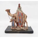 Franz Bergman style coal painted spelter table lighter in the form of Arab carpet seller on camel,