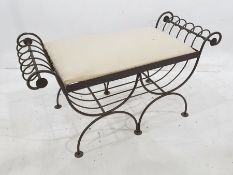 Modern wrought iron stool of scrolling design, with upholstered seat, 104cm wide