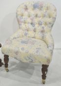 Modern chair with floral upholstery and button back