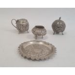 Early 20th century silver-coloured Anglo Indian three-piece cruet set (one lid missing), cylindrical