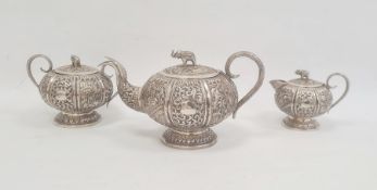 Early 20th century Anglo Indian three-piece tea set comprising teapot, two-handled sugar bowl and