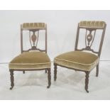 Pair of 19th century low chairs with mahogany inlaid frames, turned front legs to brown china