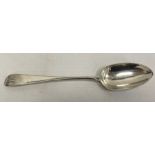 An 18th century silver tablespoon, initialled to handle, possible Glasgow, maker TM, 2.4toz. approx.