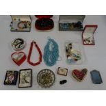 Wooden suitcase and contents of costume jewellery including a glass bead necklace, crystal pendants,