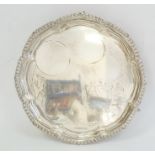 A 1940s silver salver, octofoil shaped, gadrooned border, on scroll feet, Sheffield 1942, Viners