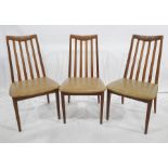 Six 1970's G-Plan teak railback dining chairs with beige leatherette seats, h. 44cmsCondition