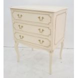 Modern three-drawer chest on cabriole legs, finished in cream, 56cm x 76.5cm