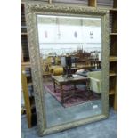 Large modern full length wall mirror of rectangular form, the mottled gilt and green frame decorated
