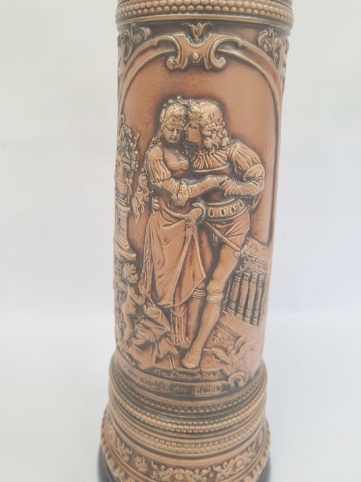 German Gerzit extra large pottery stein, embossed medieval figures and having blue glazed borders, - Image 2 of 4