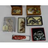 Carved hardwood box and contents including cloisonne enamel beads and other items of costume
