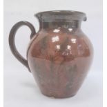 Studio pottery vase, ovoid with treacle brown glaze and line decoration of stylised plants, 26.5cm