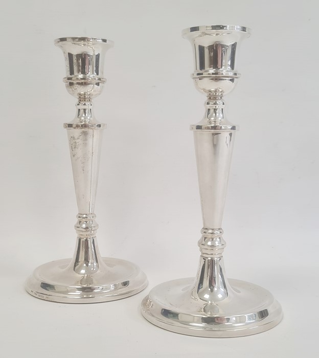 A pair of 1980s silver-filled candlesticks, tapering on circular bases, Birmingham 1987, maker W I