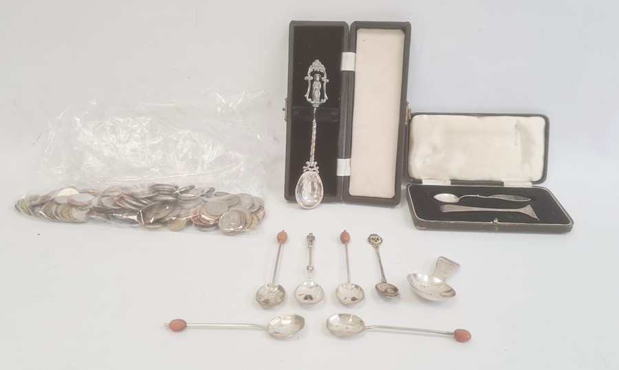 A silver cased apostle spoon, marks worn, 0.9toz approx. 15.2cm long, a 1930s cased silver pusher (