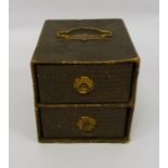 Miniature cupboard chest of two drawers and contents of gaming counters and Mahjong tiles