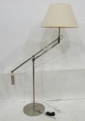 Pair of modern standard lamps in brushed steel-effect finish, cream shades (2)