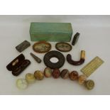 Carved onyx eggs, a parasol handle with gold-coloured collar, etc (2 boxes)