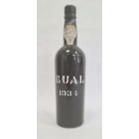 Bottle of Madeira wine, the bottle marked Bual 1934 with label to neck marked 'Selo De Garantia