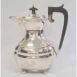 A 1930s silver coffee pot, ebony finial and handle on bun feet, Birmingham 1931, maker S Blanckensee