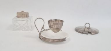 An early 20th century Coalport silver mounted egg cup and saucer, silver egg cup and handle