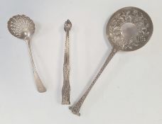 Pair of Georgian silver sugar tongs with engraved decoration and feather edge borders, maker's