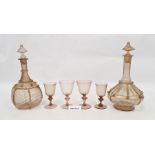 Suite of Venetian glass to include two decanters with gilt decoration, 18 larger wine glasses and 16