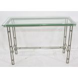 Modern glass and metal console table, the metal rod base with ball decoration and with rectangular