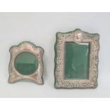 Edwardian silver mounted rectangular photograph frame, repousse and pierced scroll decoration,