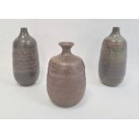 Studio stoneware bottle vase, slightly ribbed cylindrical body, 12cm high, impressed mark, pair slip
