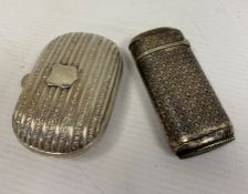 A silver coloured snuff box, marks worn and a silver vesta, marked LV, 2toz approx. in total (2)