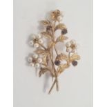 9ct gold, garnet and pearl floral spray brooch, 9.2g total