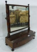 19th century mahogany dressing table mirror, the rectangular mirror on pillar supports, bow front