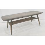 Dark elm Ercol coffee table with magazine rack under, 105cm x 36.5cm Condition ReportNumerous
