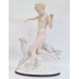 Large Royal Dux Art Deco-style tinted bisque and glazed figure of female nude throwing a ball for