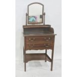 Early 20th century mahogany narrow dressing table, the arched top swing mirror above shelf,