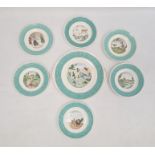 French pottery nursery set of six tea plates and one larger bread and butter plate, all variously