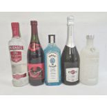 Five assorted bottles to include Smirnoff Premium Vodka, Martini Asti, Bombay Sapphire London Gin,