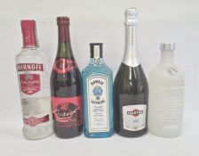 Five assorted bottles to include Smirnoff Premium Vodka, Martini Asti, Bombay Sapphire London Gin,