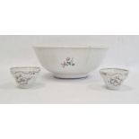 Chinese style porcelain punch bowl painted with small floral spray and having blue and gilt borders,