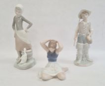 Lladro porcelain figure of a girl with duck, Lladro porcelain figure of fishing boy and Royal