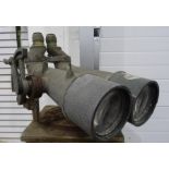 Pair of 20th century, possibly WWII, naval binoculars mounted on wooden base, binoculars unmarked,