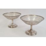 A pair Asprey & Co. silver pedestal bonbon dishes, pierced bowls on circular bases, Birmingham 1915,