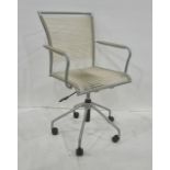 WDF office chair with plastic woven seat, raised on castors