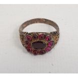 Probably Victorian garnet dress ring, unmarked, yellow metal set Condition ReportThree missing