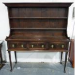 Georgian dresser, the base possibly fruitwood, fitted with three short pine-sided drawers over